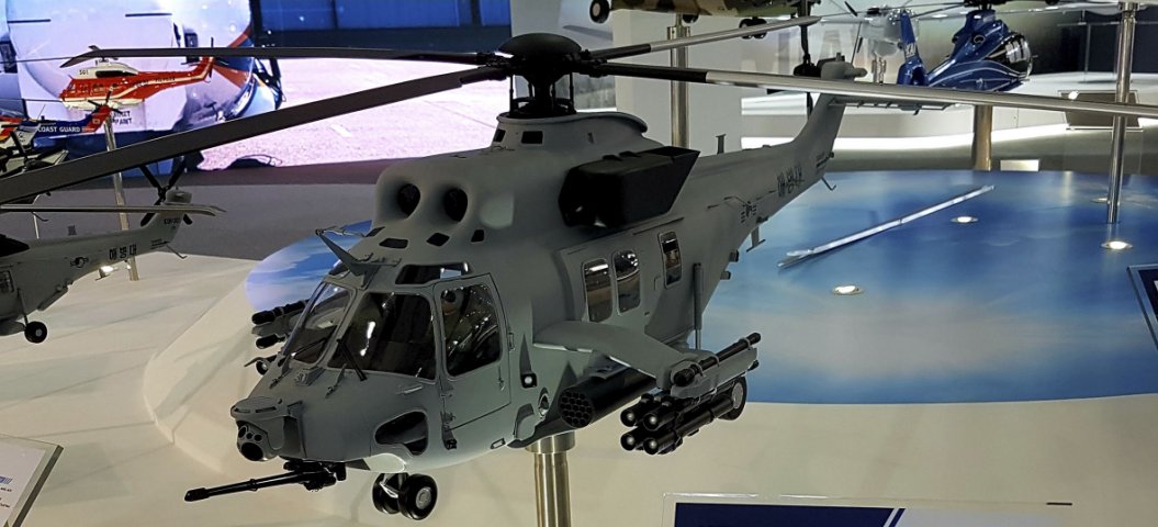 A model of the Korea Aerospace Industries Surion Marine Attack Helicopter at ADEX 2019 shows the 20 mm Gatling gun and EO/IR sensor in the nose and the stub-wing-mounted hardpoints. (IHS Markit/Gareth Jennings)