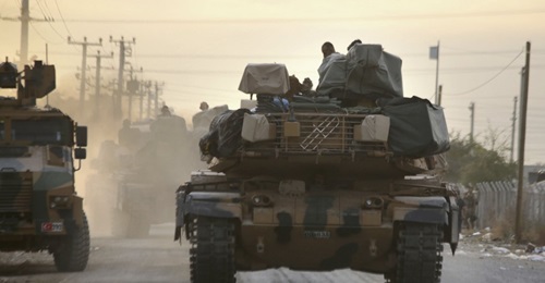 An M60TM with its turret rotated to the rear to show the TEPES mast-mounted electro-optical system (left), a remote weapon station that is probably the Aselsan SARP (right), and laser warning receivers (mounted on its bustle rack) on 11 October.