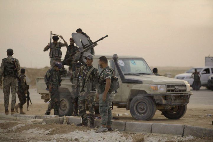 Syrian government troops are seen at Al-Tabqah Air Base, which was previously controlled by Kurdish forces, on 14 October. (Syrian Arab News Agency)