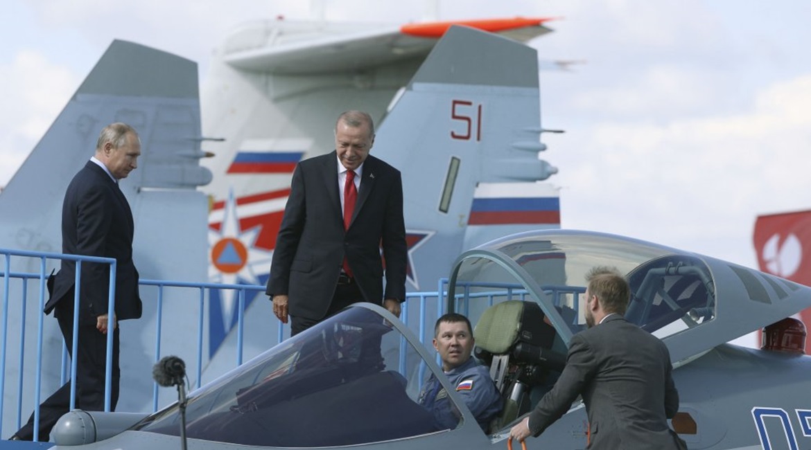Russian President Vladimir Putin and Turkish President Recep Tayyip Erdogan look over a Sukhoi Su-57 on 27 August at this year's Moscow Air Show. A deal under which Turkey will acquire Su-35s and Su-57s has reportedly been sealed.
