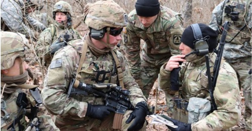 Elements of 1st Battalion, 508th Parachute Infantry Regiment, 82nd Airborne Division use Integrated Tactical Network components during a live-fire exercise at Camp Atterbury, Indiana, in January 2019.