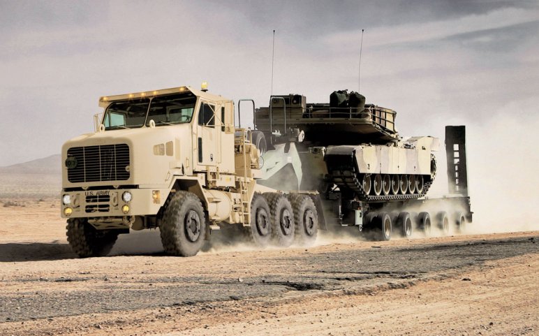 Oshkosh Defense is working to rebaseline some of the US Army's M1070A1 HET tractor fleet (pictured above) so they can travel on EU highways. (Oshkosh Defense)