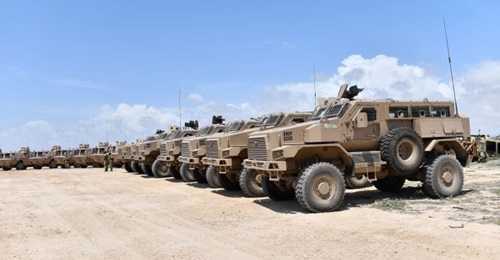 The new Springbuck HD MRAPS and Fahd wheeled APCs (background) for AMISOM's Burundian contingent are seen lined up.