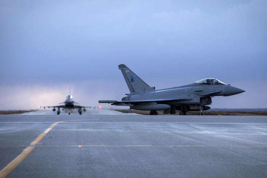 A pair of RAF Typhoons taxi to their parking apron after arriving at Keflavik Air Base on 13 November. (Crown Copyright)