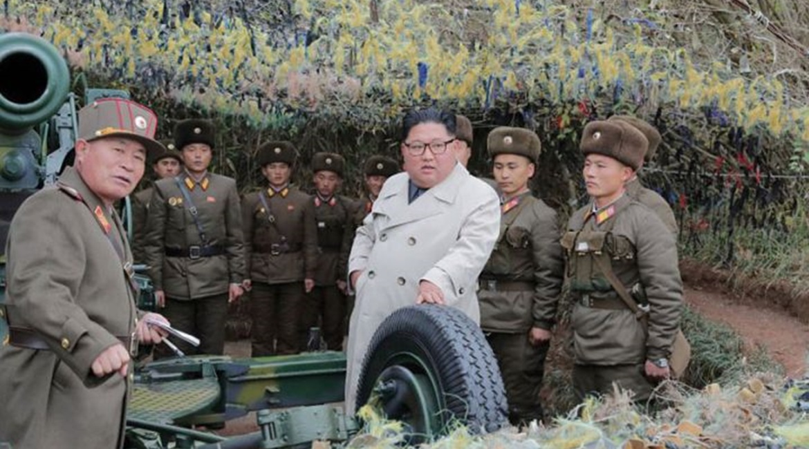 North Korean leader Kim Jong-un (centre) talking with soldiers during a visit to a military unit on Changrin Islet near the western sea border with South Korea.