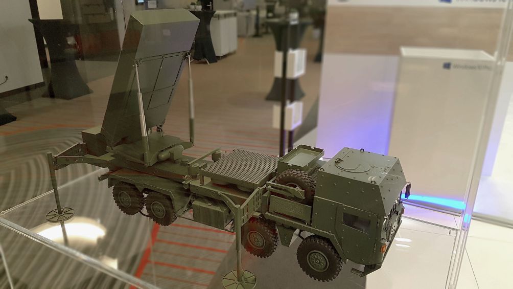 A model of one of the constituent components of the TLVS system being offered for Germany's MEADS programme, displayed at the Berlin Security Conference 2019. (IHS Markit/ Gareth Jennings )