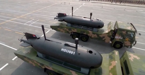 A screen capture showing two HSU001 unmanned underwater vehicles being shown in public for the first time during a military parade in Beijing on 1 October.