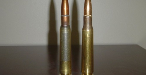 A standard .50 calibre round (right) and MAC's .50 calibre polymer round (left).