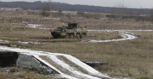 A BTR-4E equipped with the Limpid Armor vehicle modernisation kit navigates a series of obstacles and a marked route using only the input provided by the system's sensors.