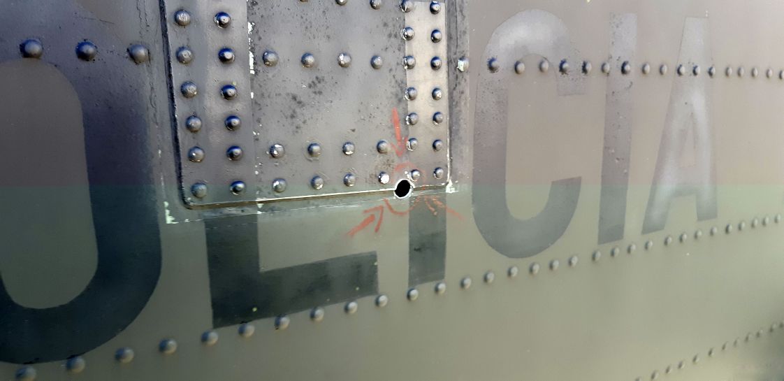 One of four 5.56 mm bullet holes in the tail of a Colombian National Police Sikorsky UH-60L Black Hawk helicopter. Since the bullet damaged vital structural components, Sikorsky Colombia is sending in a team to perform depot level repairs that the police are unable to perform themselves. (Jane’s/Pat Host)
