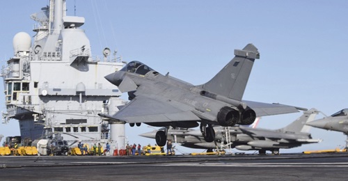 A French Rafale M fighter lands on 
        
         during 'PEAN 2019'.