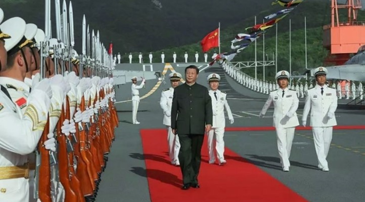 Chinese President Xi Jinping attended the commissioning ceremony of 
        
        , the PLAN's second aircraft carrier, on 17 December at the Sanya-Yulin naval base on Hainan Island.