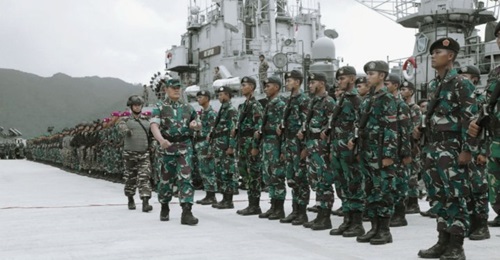 Vice-Admiral Yudo Margono, commander of the Indonesian Armed Forces Joint Regional Command I, inspecting the military line up at Great Natuna Island on 5 January.