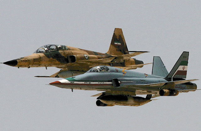 The twin-tailed Saeghe (foreground) in formation with an F-5F during military exercises. Iran fields a fighter force that is made up of either ageing types received from abroad, or domestically-developed types of questionable capabilities. it is doubtful that the IRIAF would be able to mount any long-term opposition to any concerted US air campaign. (Iranian MoD)