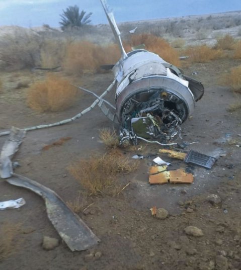 The remnants of a missile are seen near Al-Baghdadi, about 10 km from Iraq’s Ain al-Asad Air Base on 8 January. It shows the top of the rocket motor where the guidance section tapers towards the re-entry vehicle, which is not present. The conduits that are common to ‘Scud' derivatives - including the Iranian Qiam - have come away from the side of the motor on the left. (Al-Baghdadi township/Handout/Anadolu Agency via Getty Images)