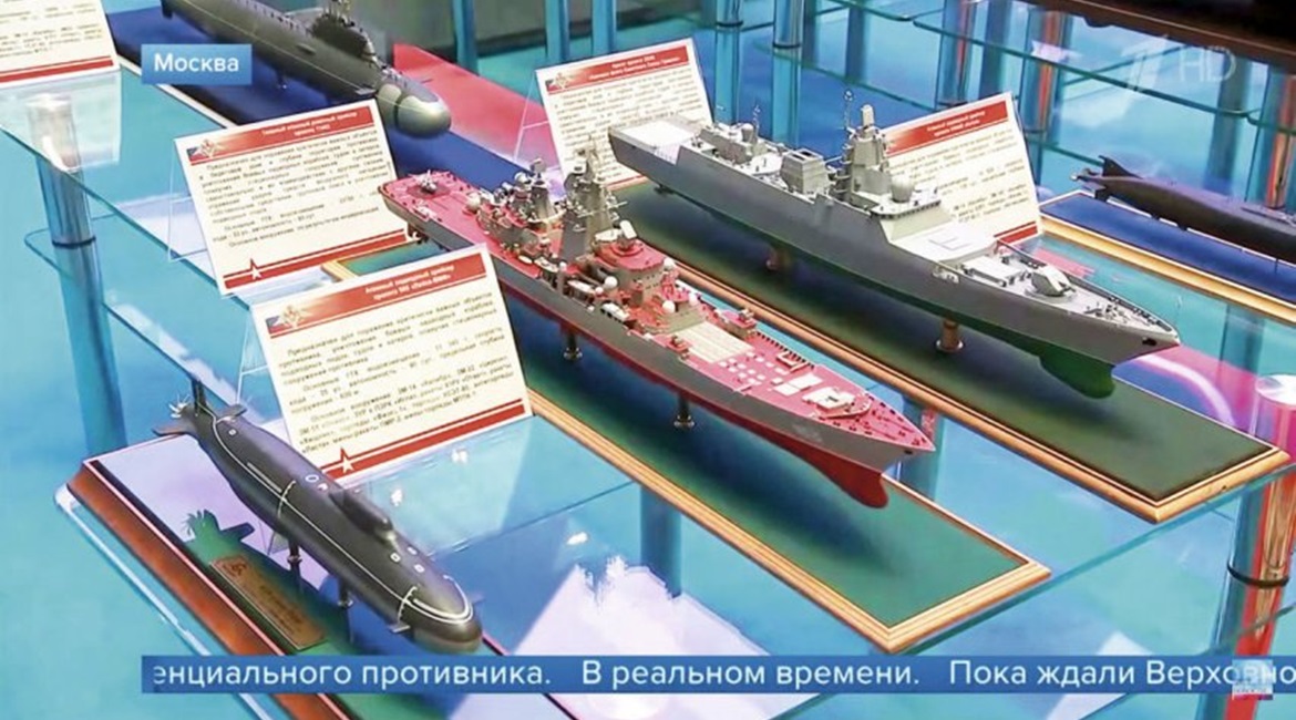 A still taken from a news report on Russia's Channel One television station aired on 24 December 2019 shows the Project 585 submarine (left) and upgraded Project 11442M cruiser (centre).