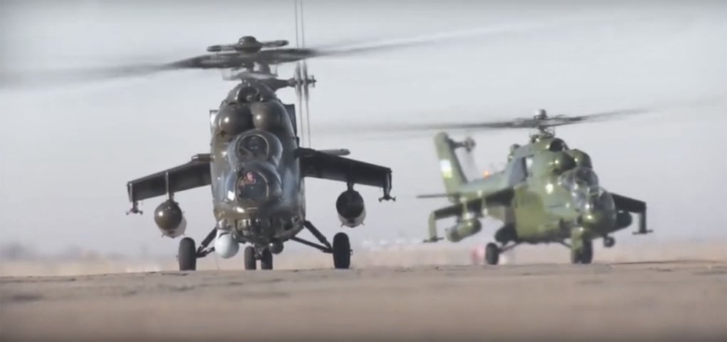 Screenshot of an Uzbekistan news report from 14 January showing at least one new Mil Mi-35M ‘Hind’ assault helicopter (foreground) that was recently delivered to the country. The helicopter in the background is an earlier-variant Mi-24. (O’Zbekiston24)