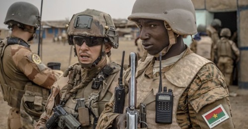 French soldiers from the Richelieu Desert Battle Group (GTD) are seen after crossing from Mali into northern Burkina Faso to link up with soldiers from the 11th Infantry Commando Regiment (RIC) during an operation in May-June 2019.