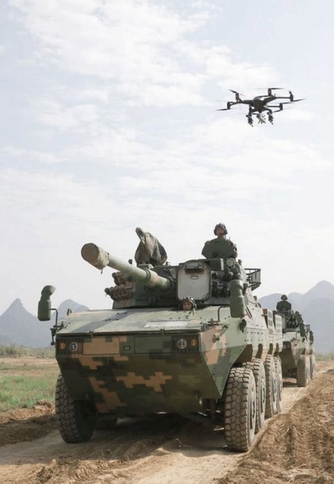 An image showing Harwar's Zhanfu (Tomahawk) H16-V12 UAV hovering over a PLA Ground Force ZBD-09 wheeled self-propelled gun at an undisclosed location: an indication that the UAV is either being trialled by or already in service with the PLA.