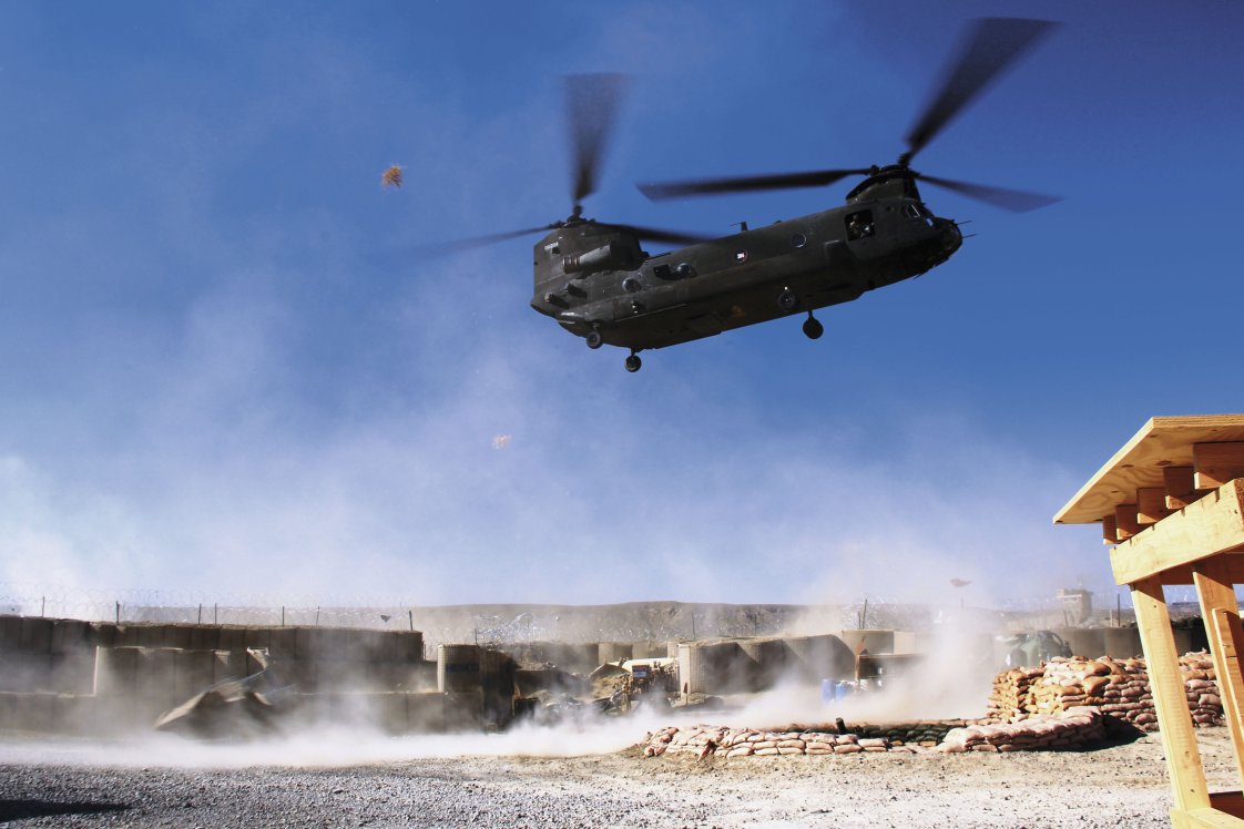 A US Army Chinook helicopter is seen landing at an outpost in eastern Afghanistan in 2011. The DoD has said it will equip the Afghan Special Mission wing with an undisclosed number of such helicopters for counter-terrorism purposes. (Jane’s/Gareth Jennings)