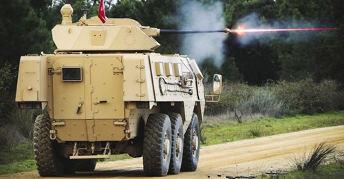 A French Arquus VAB Mk 3 fitted with the PWS Gen 2 engages a target while moving.
