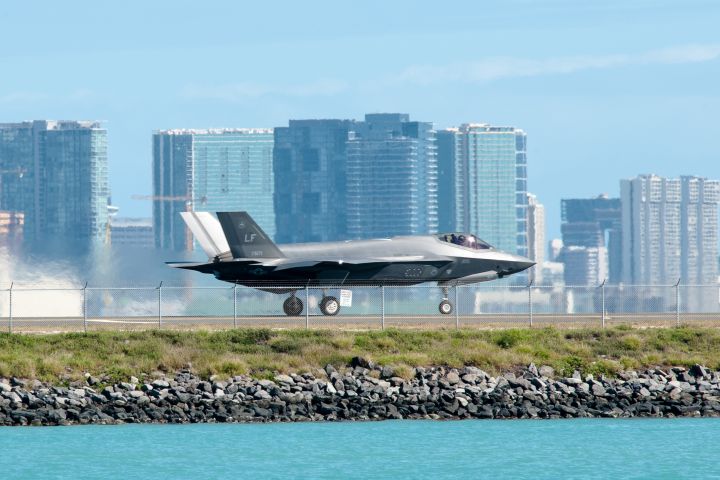 A F-35A, assigned to Luke Air Force Base, Arizona, taxis down the Honolulu Airport runway on 29 January 2019. Newer model F-35As have developed cracking in the outer mold-line coatings and the underlying chine longeron skin after gun use. (US Air Force)