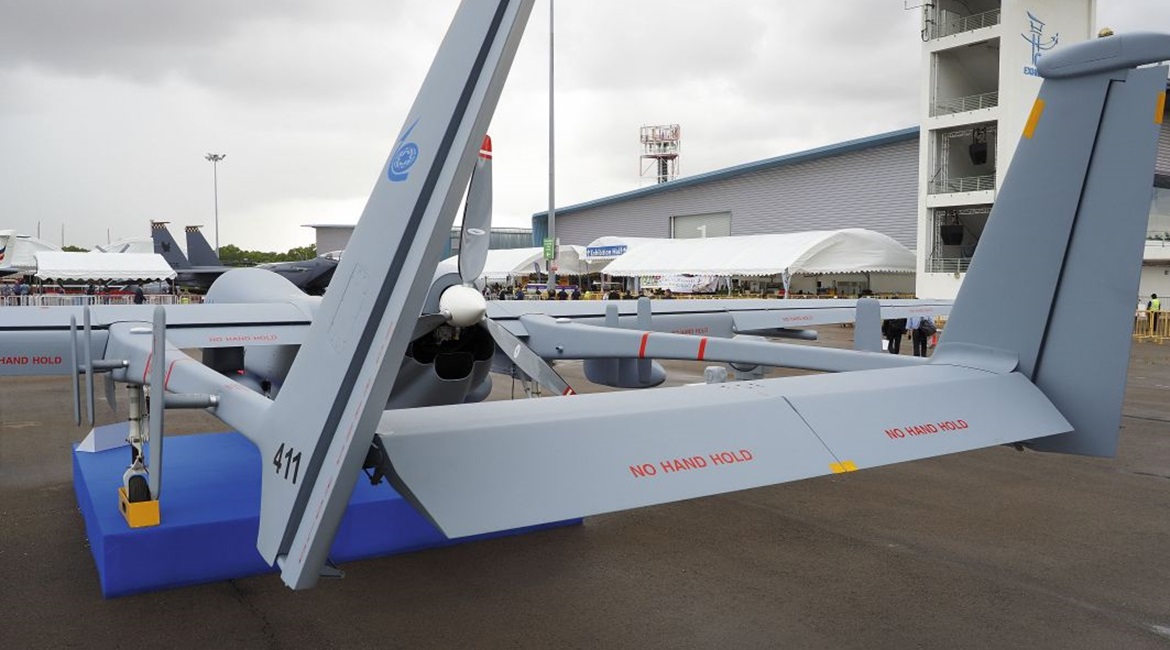 Rear view of the new Heron MKII UAV, clearly showing its Rotax 915 iS engine and three-bladed pusher propeller.