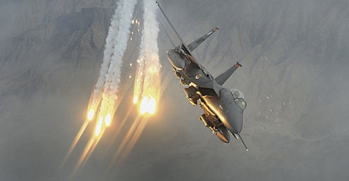 A US Air Force F-15E Strike Eagle dispenses flares during the supposed-height of the Afghan conflict in 2010. Since that time, the number of airstrikes conducted by US aircraft has markedly increased, with 2019 posting record figures. The first month o...