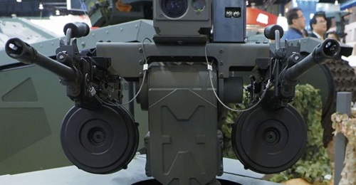Close up of the Adder Micro remote weapon station, showing its twin weapons mount and independent optical sensors.