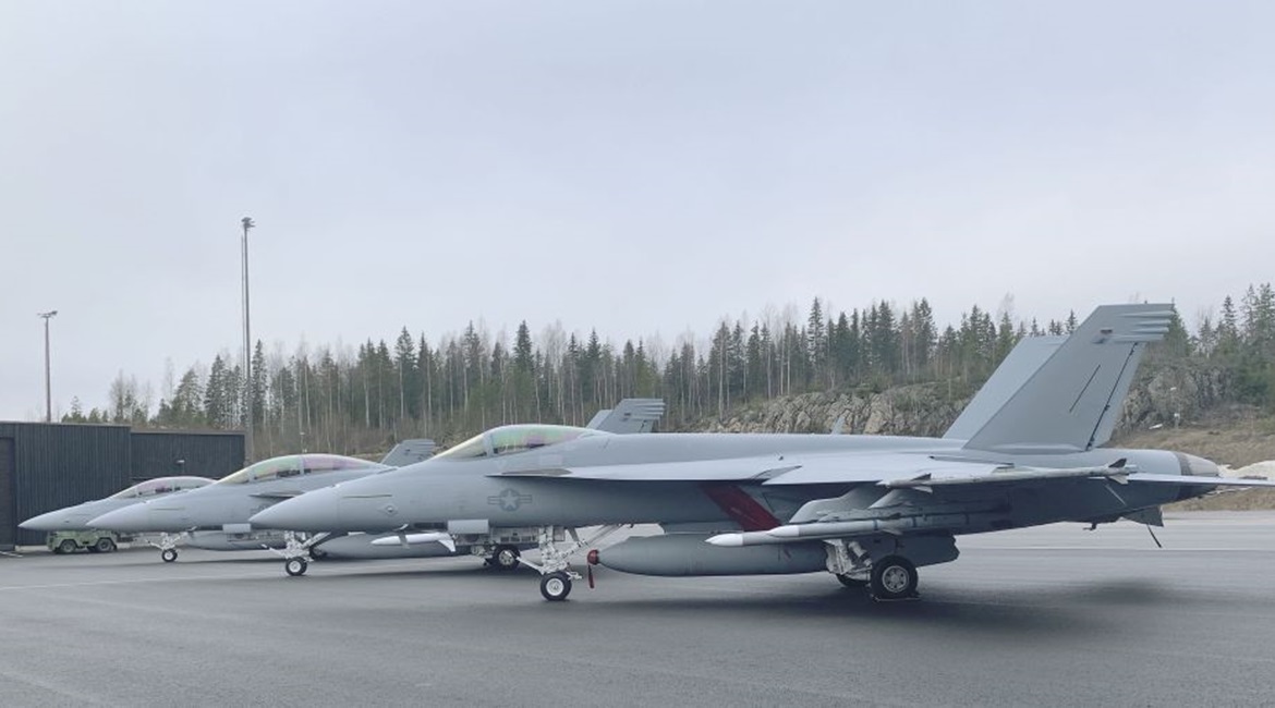 Boeing F/A-18 E and F Super Hornets, and an E/A-18G Growler at Pirkkala Air Force Base for the Finnish Air Force's HX Challenge.