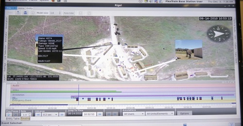 Screenshot of the ORION exercise control and analysis software in the Ravenswood MGTI system, showing exercise activity with live video and entity identification tag. The exercise timeline is along the bottom.