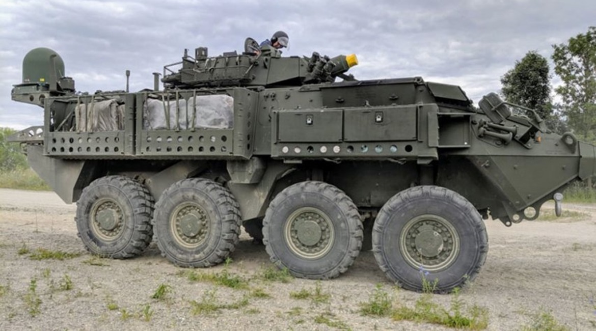 A Canadian LAV 6.0 is shown fitted with the ELSAT 2100 satcom on-the-move system.
