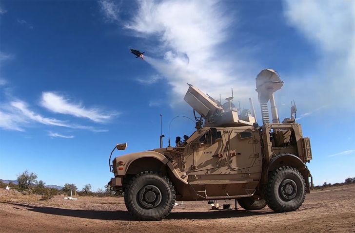 A US Army Joint Light Tactical Vehicle furnished with the co-mounted Coyote launcher, KuRFS 360° detection and intercept radar, and FAAD/C-RAM C2 system launches the new Coyote Block 2 interceptor during acceptance trials at the Yuma Proving Ground, Arizona. (Raytheon)