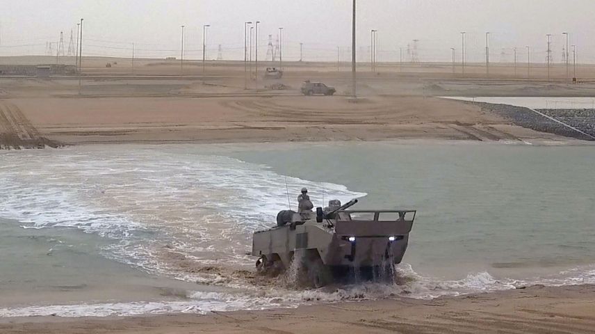 A Rabdan emerges from the canal at the Al-Hamra Combat Training Centre during Exercise ‘Native Fury’. (WAM)