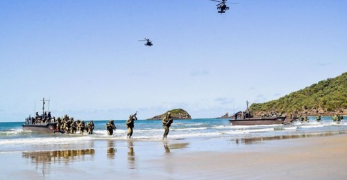 SAF and ADF personnel participating in a bilateral ship-to-shore mission during 'Exercise Trident' in SWBTA in Queensland, Australia.