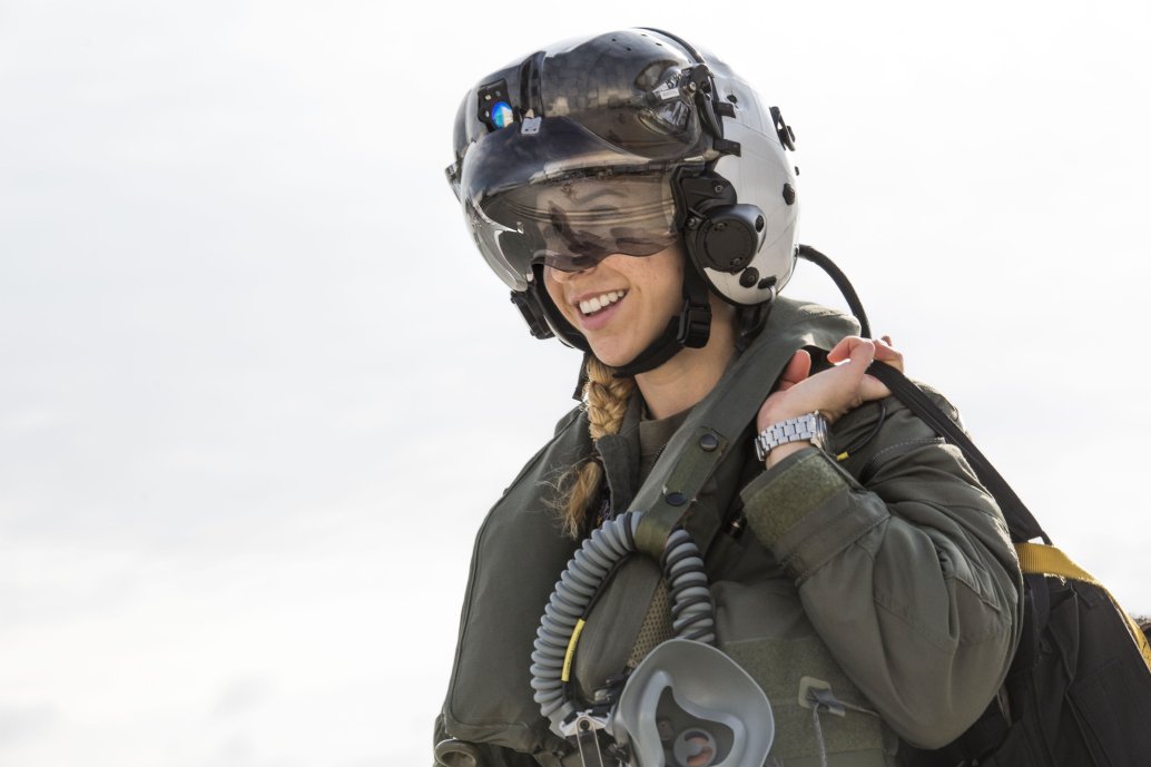 Captain Anneliese Satz walks to her F-35B to begin flight checks for a training flight aboard Marine Corps Air Station Beaufort 11 March 2019. The F-35's HMD was redesigned with organic light emitting diodes (OLEDs), which reduced a green glow and brightness problem. (US Marine Corps)