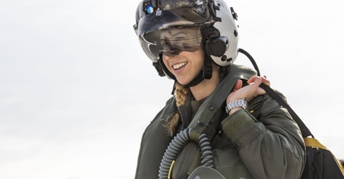 Captain Anneliese Satz walks to her F-35B to begin flight checks for a training flight aboard Marine Corps Air Station Beaufort 11 March 2019. The F-35's HMD was redesigned with organic light emitting diodes (OLEDs), which reduced a green glow and brig...