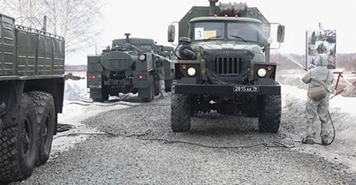 Russian CBRN protection troops decontaminate military vehicles during a readiness exercise on 25-28 March.