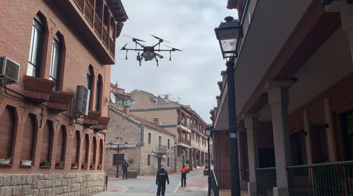 Spain's Military Emergency Unit has deployed modified multirotor UASs such as the DroneTools Hexa AG to assist pandemic mitigation efforts.