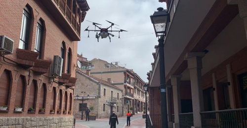 Spain's Military Emergency Unit has deployed modified multirotor UASs such as the DroneTools Hexa AG to assist pandemic mitigation efforts.