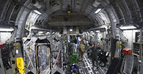 A US Air Force C-17 is prepped to transport a Transportation Isolation System (TIS) on 6 March 2019. The USAF on 10 April 2020 conducted the first operational use of the TIS to perform an aeromedical evacuation of three federal government contractors w...