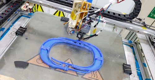A 3D printer at an Airbus site in Spain makes frames for protective face shields