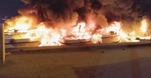 An image, published by the Maldives National Defence Force on 15 April, of the Islamic State-claimed arson attack on the coast of Mahibadhoo Island, South Ari Atoll.