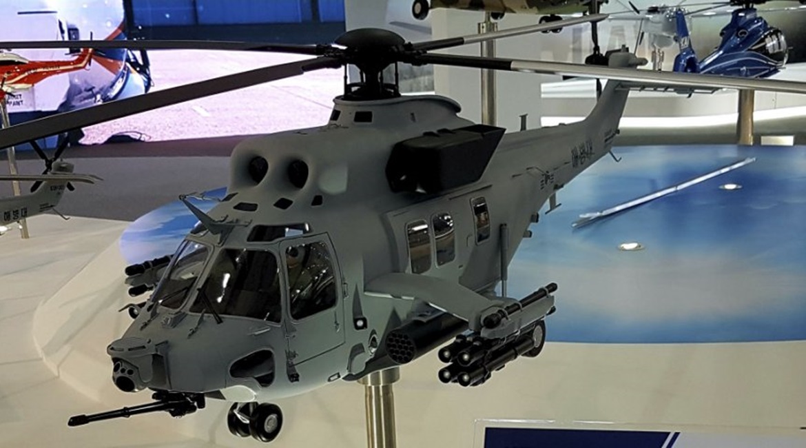 A model of the KAI Surion MAH at ADEX 2019 shows the 20 mm Gatling gun and EO/IR sensor in the nose and the stub-wing-mounted hardpoints