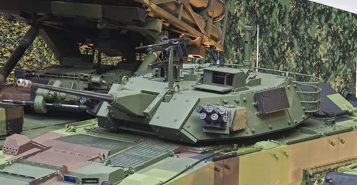 The CM-34 IFV's protected turret seen here armed with a 30 mm Mk44 Bushmaster II cannon.