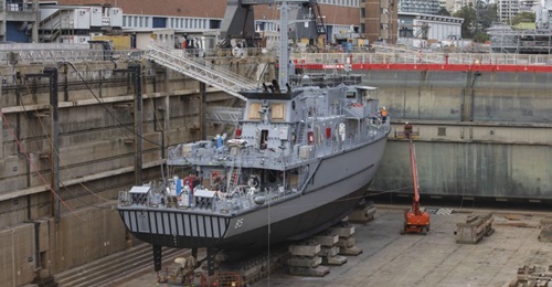Huon-class minehunter HMAS 
        
         undergoing a refit in the Captain Cook Graving Dock at Garden Island, Sydney following a recent deployment.
