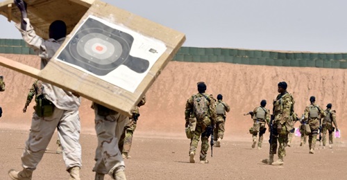 Malian and Mauritanian soldiers participate in training at the Kamboinsé General Bila Zagre military camp near Ouagadougo in Burkina Faso during a military anti-terrorism exercise with US Army instructors on 12 April 2018. Approximately 1,500 Afri...