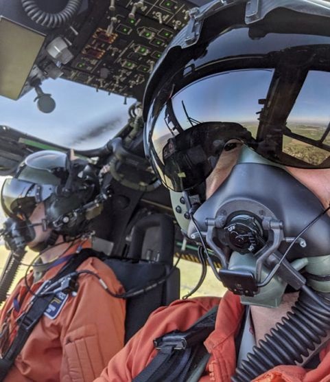 Leonardo Helicopters UK flight test crew demonstrate the newly adapted helmet and facemask that is designed to enable crews to fly during the coronavirus pandemic.