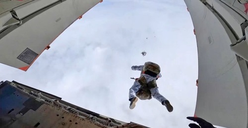Russia's VDV undertaking the world's first parachute jump from an aircraft at a height of 10 km in the Arctic close to Franz Josef Land. Russian Defence Minister Sergei Shoigu said Russian paratroopers performed the jump in commemoration of the upcomin...