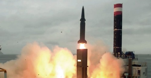 An 800 km-range Hyunmoo-2C ballistic missile being fired from a truck-mounted launcher.